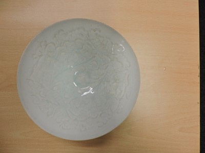 Lot 139 - Three Chinese qingbai glazed bowls