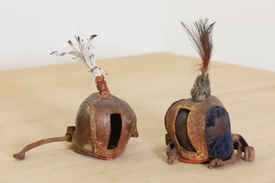 Lot 40 - Two leather falcon hoods