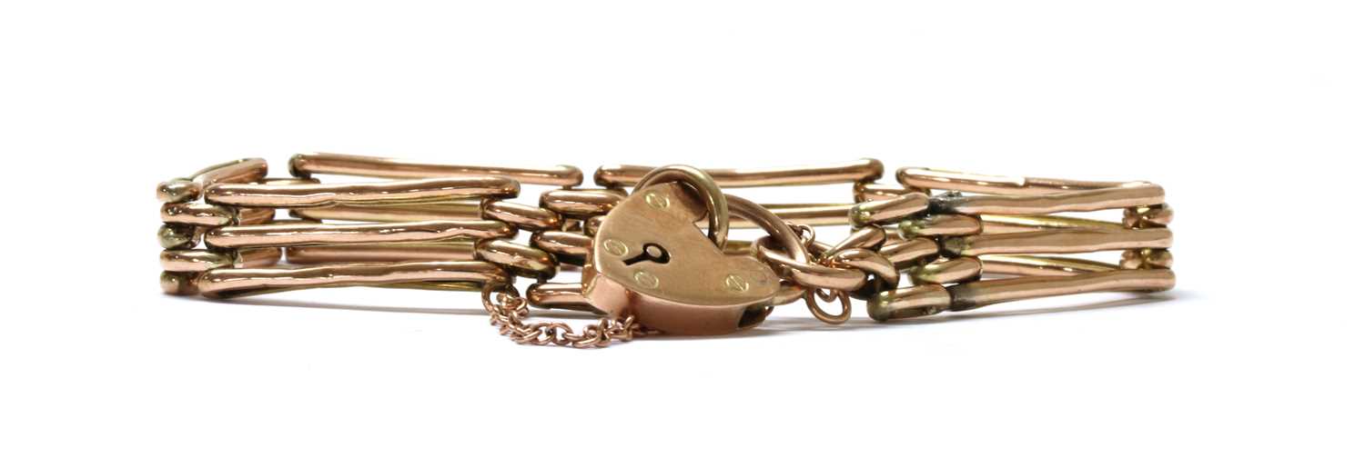 Lot 115 - A gold gate bracelet