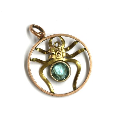 Lot 19 - An Edwardian gold paste and split pearl spider pendant
