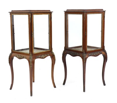 Lot 240 - A pair of late Victorian mahogany bijouterie cabinets