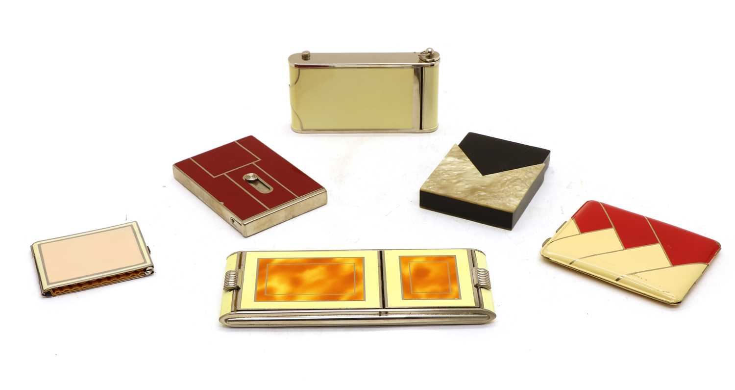 Lot 113 - Two combination ladies cigarette cases and compacts