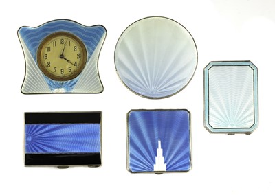 Lot 211 - Three silver and enamelled ladies' compacts