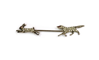 Lot 1053 - A Continental silver paste set hunting scene pin