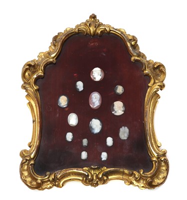 Lot 203 - Fourteen unmounted carved hardstone oval and circular cameos