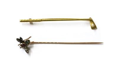 Lot 1039 - A gold and silver, diamond, ruby and cat's eye quartz bee stick pin