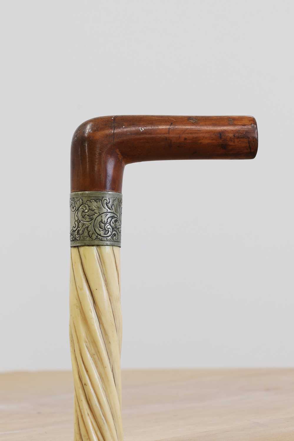 Lot 133 - A narwhal tusk walking stick