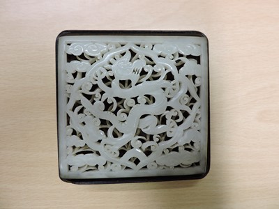Lot 244 - A Chinese jade plaque