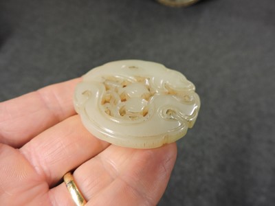 Lot 270 - Three Chinese carved jade plaques