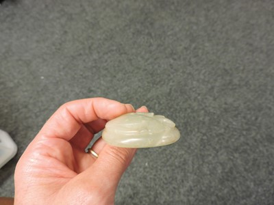 Lot 255 - A Chinese jade plaque