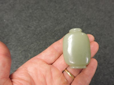 Lot 268 - Two Chinese carved jade snuff bottles