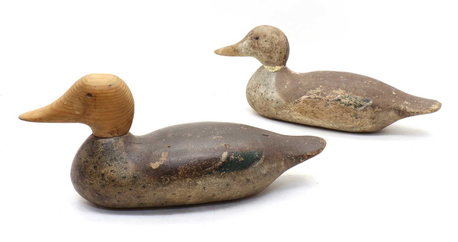 Lot 36 - Two carved wood and painted duck decoys