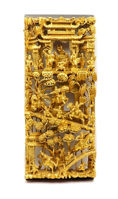 Lot 186A - A Balinese gilded wall plaque with dancers dancing and warriors jousting
