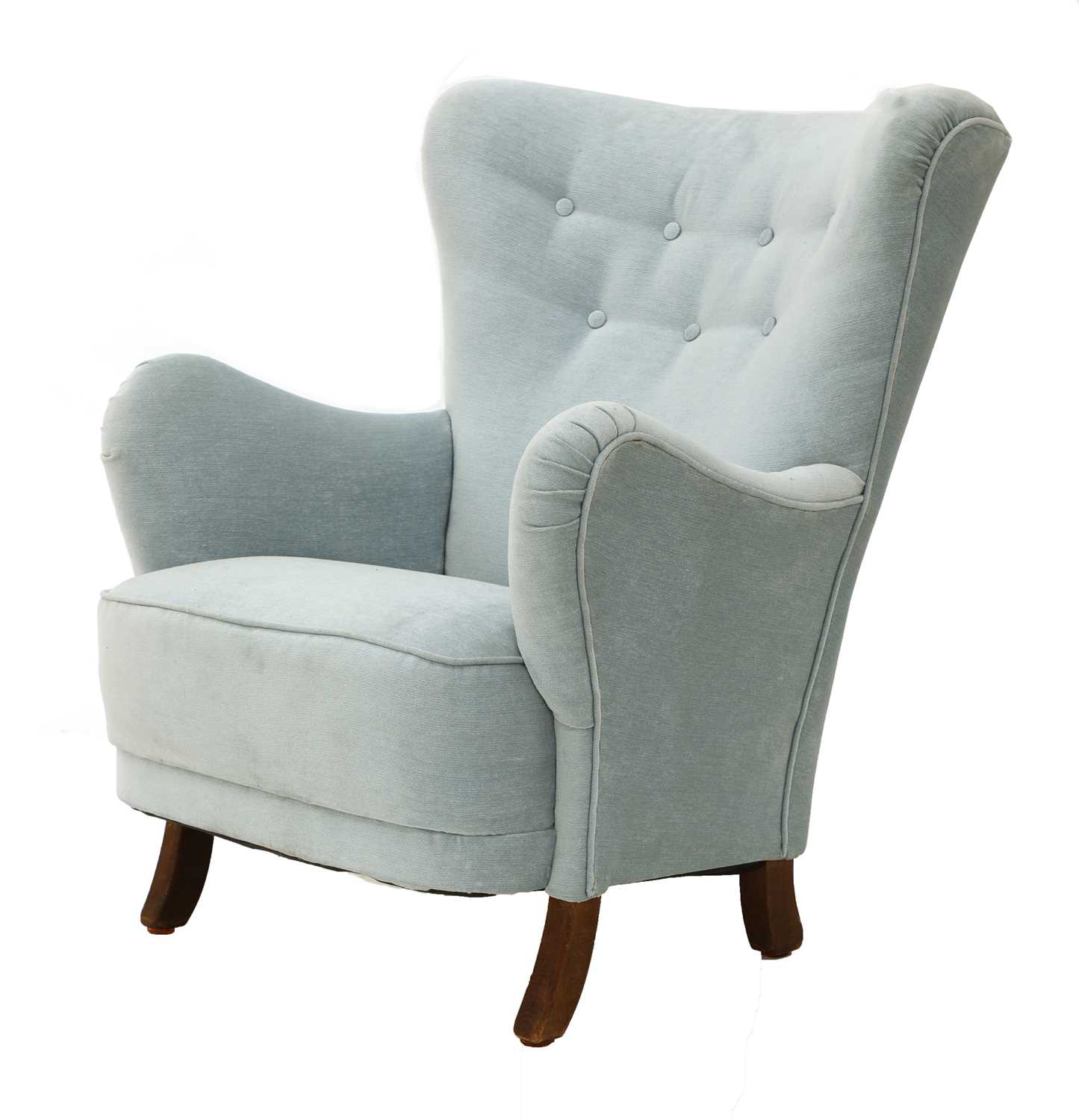 Lot 558 - A light blue upholstered armchair