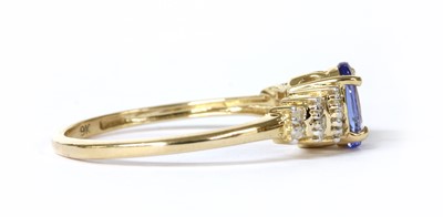 Lot 308 - A gold tanzanite and diamond ring
