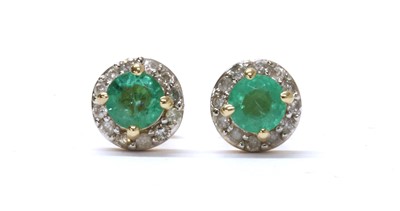 Lot 160 - A pair of gold emerald and diamond cluster stud earrings