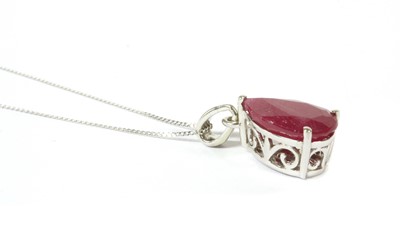 Lot 227 - A white gold single stone fracture filled ruby pendant