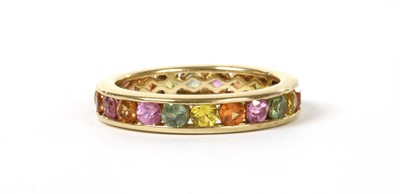 Lot 146 - A gold varicoloured sapphire full eternity ring