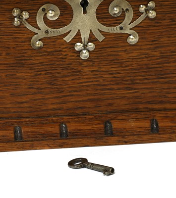 Lot 71 - An Arts and Crafts oak and pewter-mounted casket