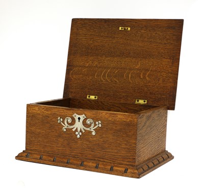 Lot 71 - An Arts and Crafts oak and pewter-mounted casket