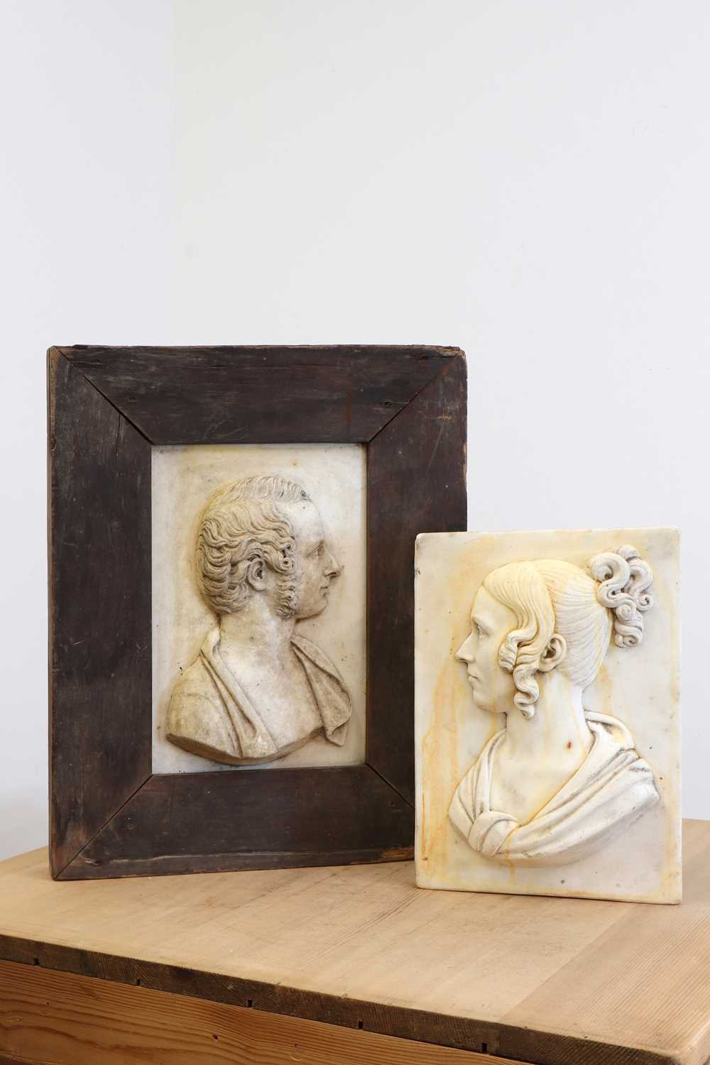 Lot 135 - A pair of carved marble reliefs