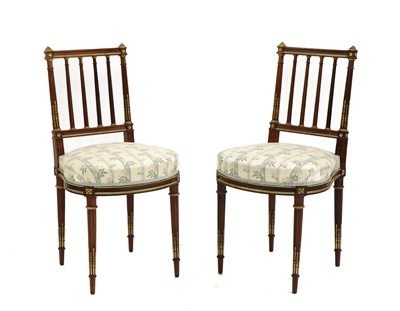 Lot 373 - A pair of French Empire style rosewood side chairs