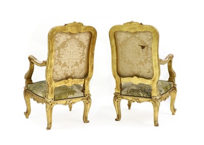 Lot 327 - A pair of French Regence-style giltwood fauteuils