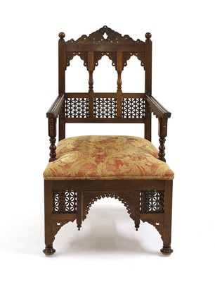 Lot 33 - An Aesthetic Movement Moorish mahogany armchair