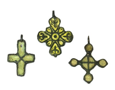 Lot 1334 - Three medieval Viking era bronze enamel cross pendants