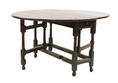 Lot 304 - A late 17th century oak gateleg table