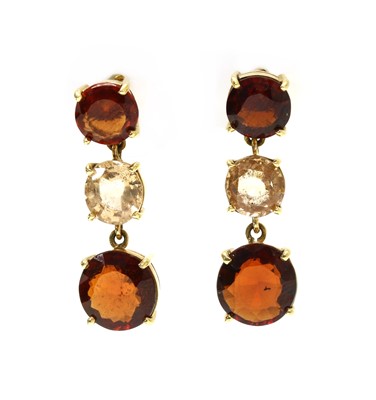 Lot 243 - A pair of gold three stone garnet drop earrings