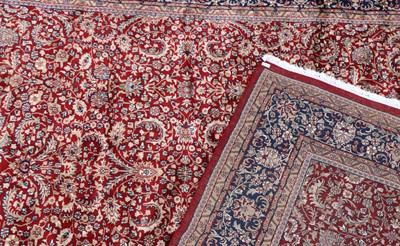 Lot 342 - A Kashmiri wool and silk rug of Persian Tabriz design