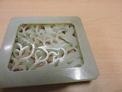 Lot 265 - A Chinese jade plaque