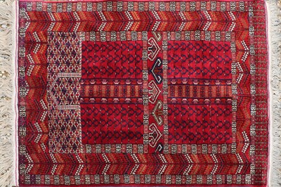 Lot 344 - An Afghan tribal wool rug