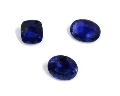Lot 1403 - Two unmounted oval mixed cut sapphires