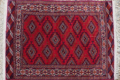 Lot 343 - A tribal wool rug
