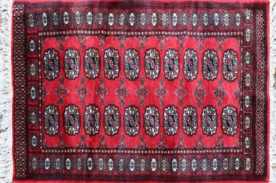 Lot 345 - A tribal wool rug