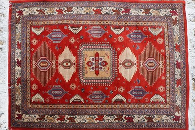 Lot 345 - A tribal wool rug