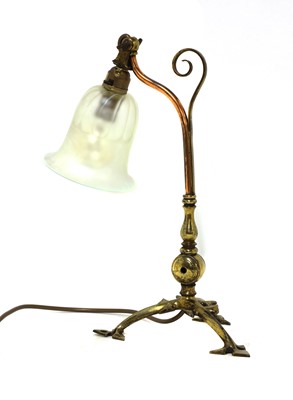 Lot 142 - An Arts and Crafts copper and brass table lamp