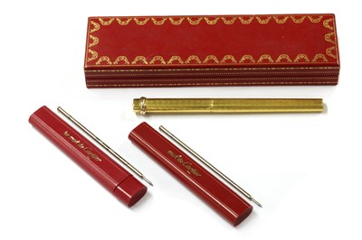 Lot 1356 - A gold plated Must de Cartier ballpoint pen