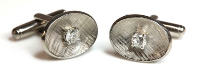 Lot 291 - A pair of single stone diamond set cufflinks
