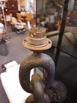 Lot 488 - A brutalist cast iron standard lamp