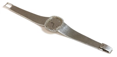 Lot 443 - A ladies’ 18ct white gold diamond set Omega ‘De Ville’ mechanical bracelet watch