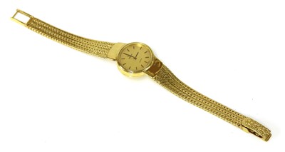 Lot 518 - A ladies’ 18ct gold Omega quartz bracelet watch