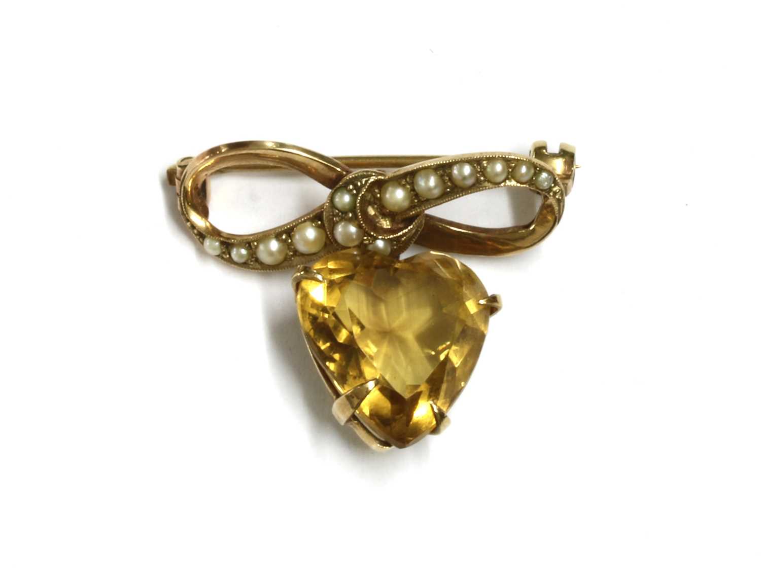 Lot 142 - A gold citrine and split pearl brooch