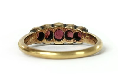 Lot 1025 - A gold and silver garnet ring