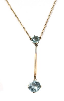 Lot 1062 - A gold aquamarine Edna May pendant