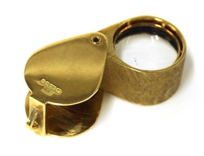 Lot 283 - An 18ct gold cased loupe