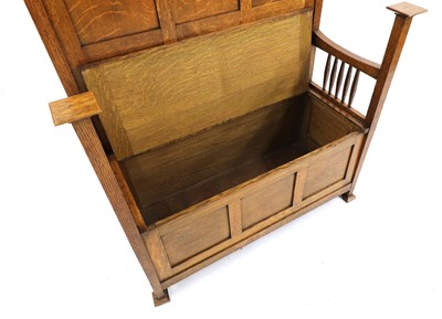 Lot 131 - An Arts and Crafts oak settle
