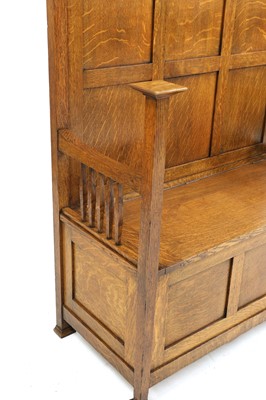 Lot 131 - An Arts and Crafts oak settle